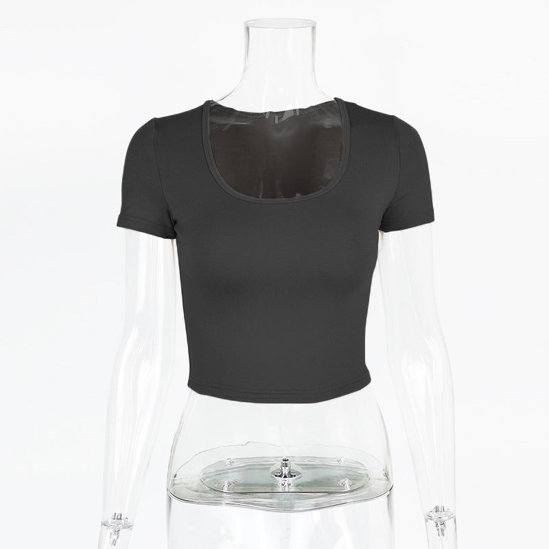 Dame kortärmad crop-top med rundhalsringning och figurnära passform Mirla-Eva Jonsson
