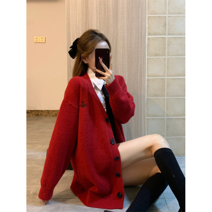 Dame kramig långärmad cardigan med stora knappar och oversized snitt Mirla-Eva Jonsson