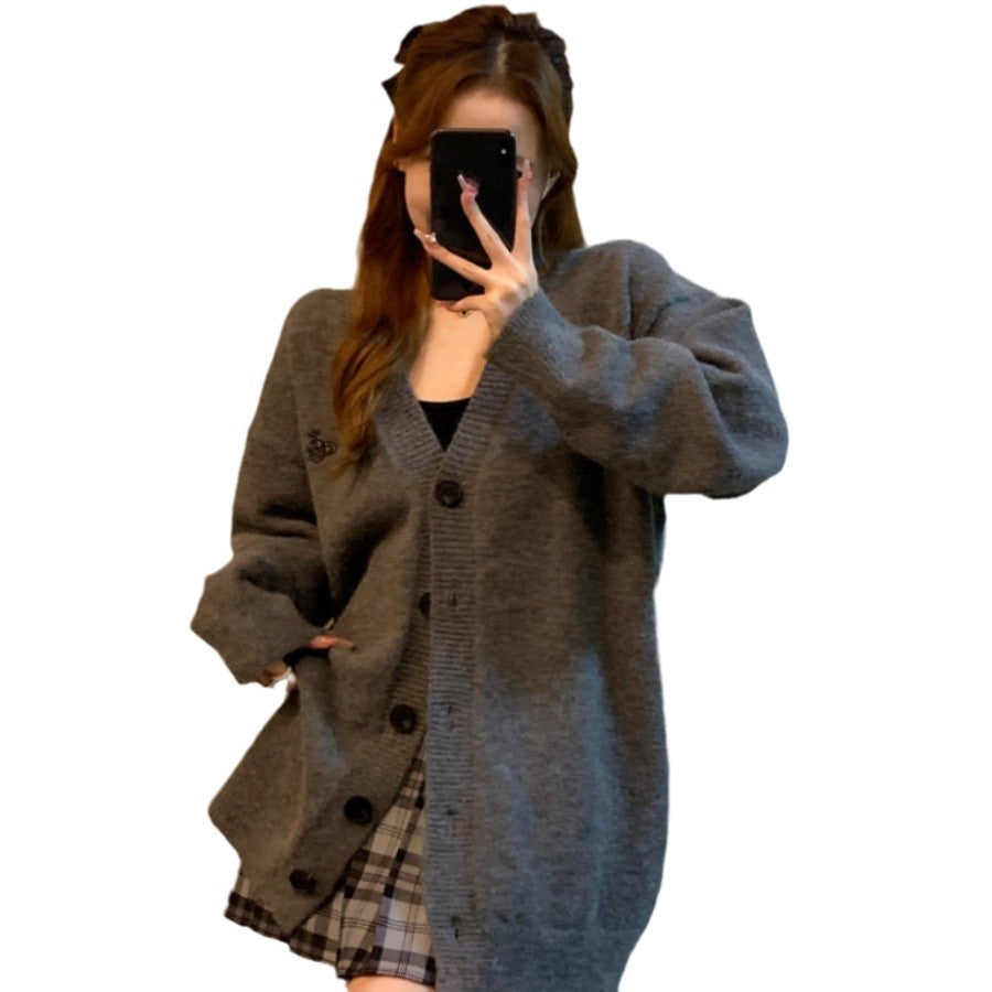 Dame kramig långärmad cardigan med stora knappar och oversized snitt Mirla-Eva Jonsson