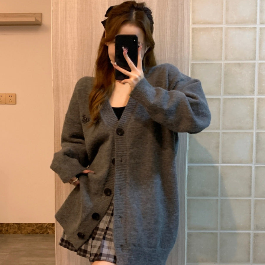 Dame kramig långärmad cardigan med stora knappar och oversized snitt Mirla-Eva Jonsson