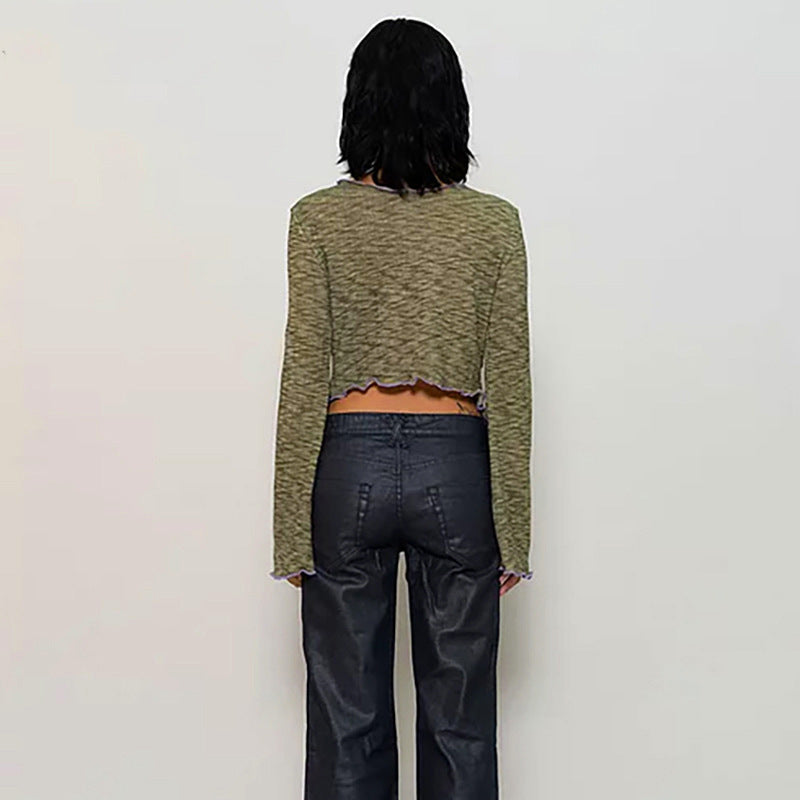 Dame långärmad tröja med asymmetrisk halsringning och detaljälskande cut-out Mirla-Eva Jonsson