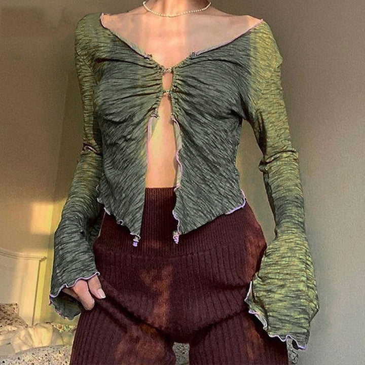 Dame långärmad tröja med asymmetrisk halsringning och detaljälskande cut-out Mirla-Eva Jonsson