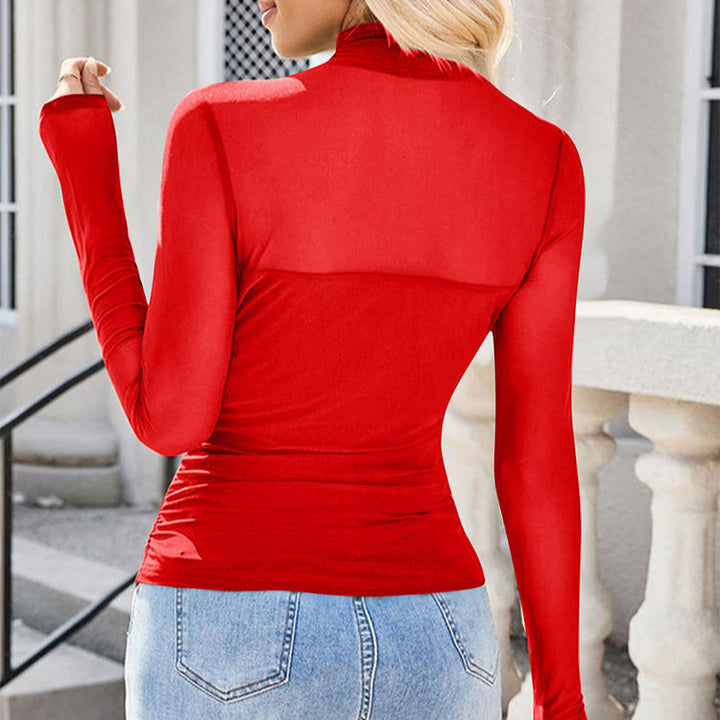 Dame långärmad tröja med elegant drapering och transparent design Mirla-Eva Jonsson