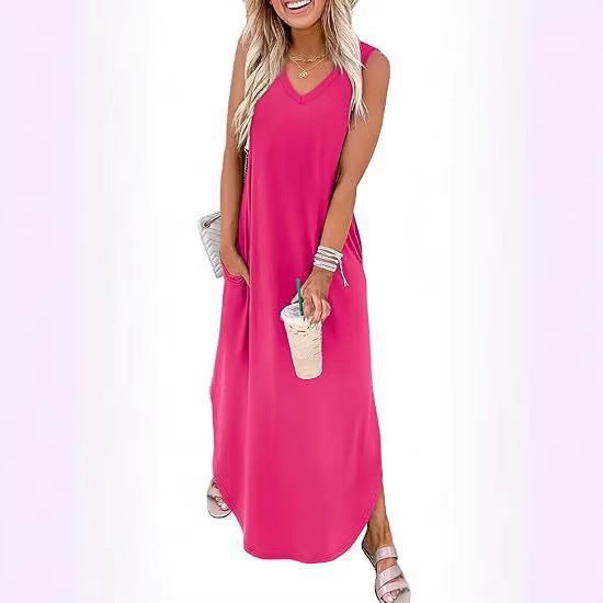 Dame maxi dress med modern V-udskæring og praktisk lomme design Mirla-Eva Jonsson