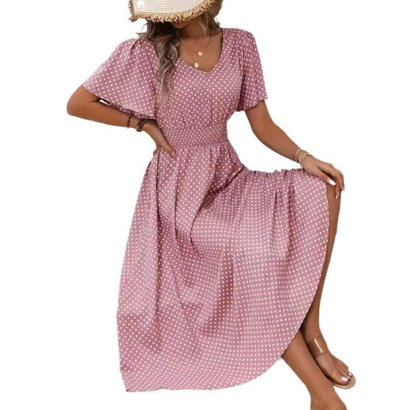 Dame maxikjol i lekfullt prickmönster med voluminösa ärmar och djup V-hals Mirla-Eva Jonsson
