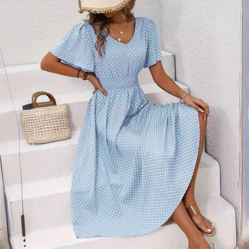 Dame maxikjol i lekfullt prickmönster med voluminösa ärmar och djup V-hals Mirla-Eva Jonsson