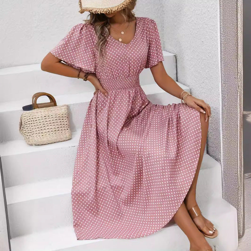 Dame maxikjol i lekfullt prickmönster med voluminösa ärmar och djup V-hals Mirla-Eva Jonsson