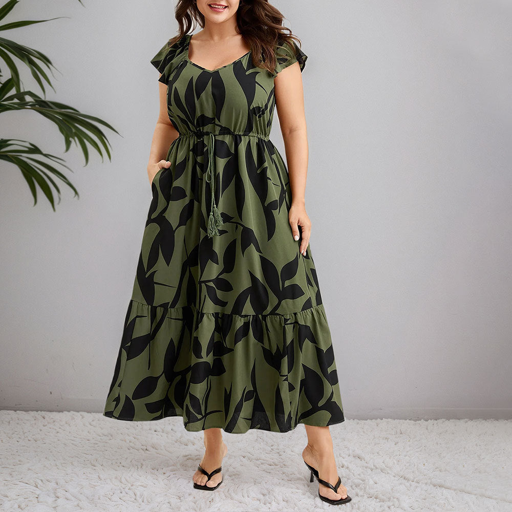 Dame maxikjol med blommönster och figursydd silhuett Mirla-Eva Jonsson