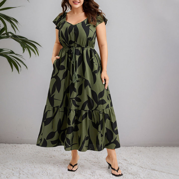 Dame maxikjol med blommönster och figursydd silhuett Mirla-Eva Jonsson