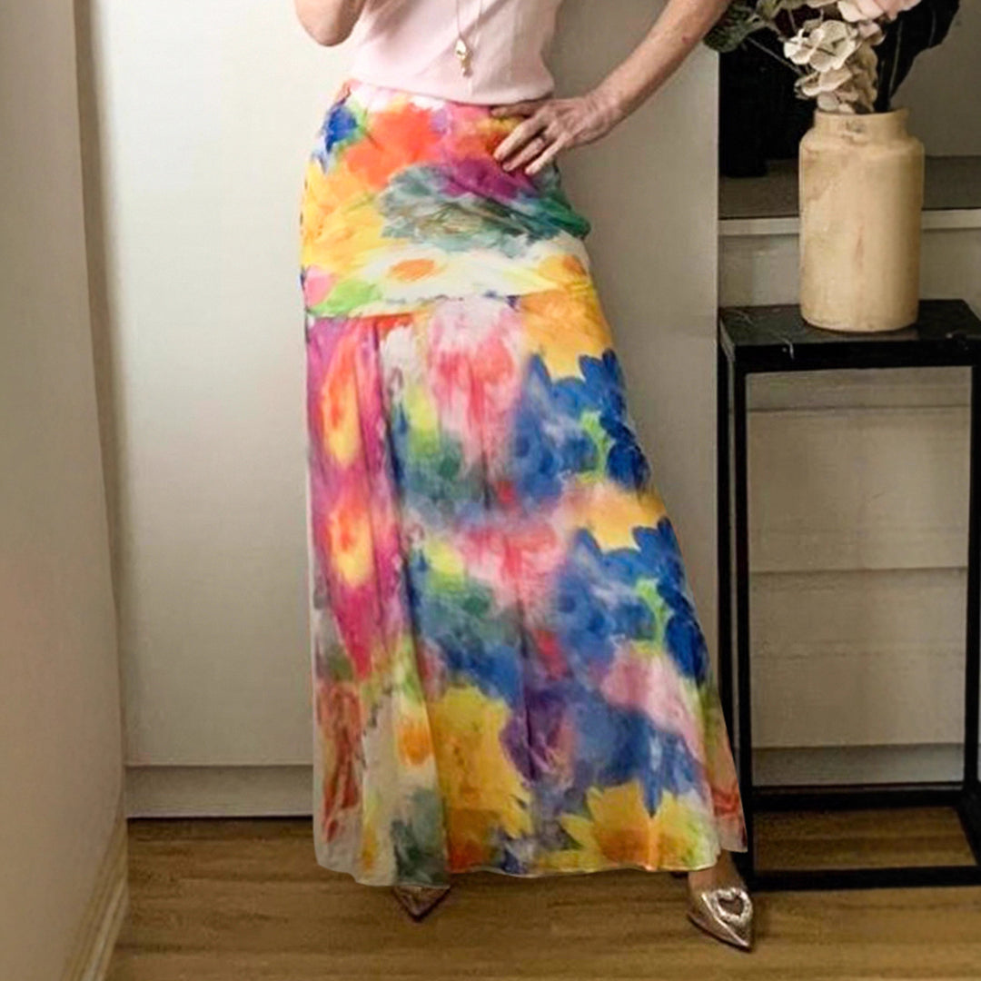Dame maxikjol med elegant blommönster och flödande snitt Mirla-Eva Jonsson