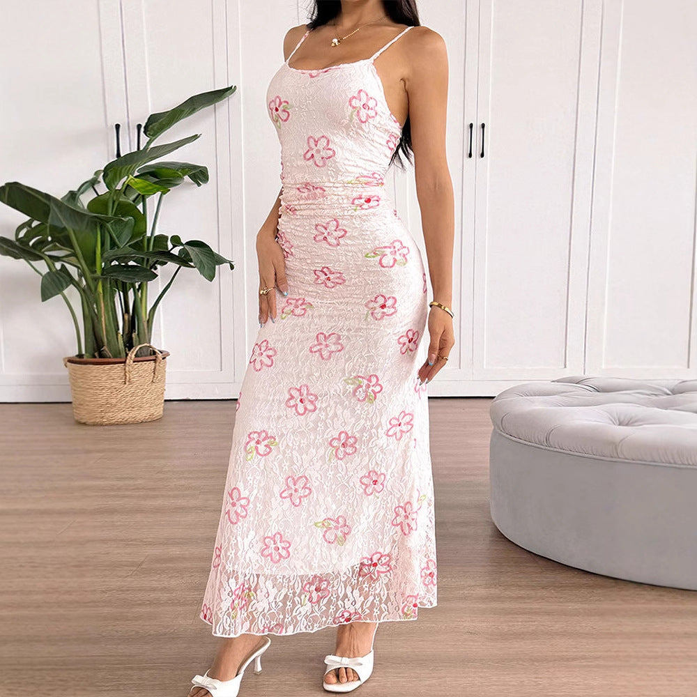Dame maxiklänning med blommigt spetsmönster och justerbara axelband Mirla-Eva Jonsson