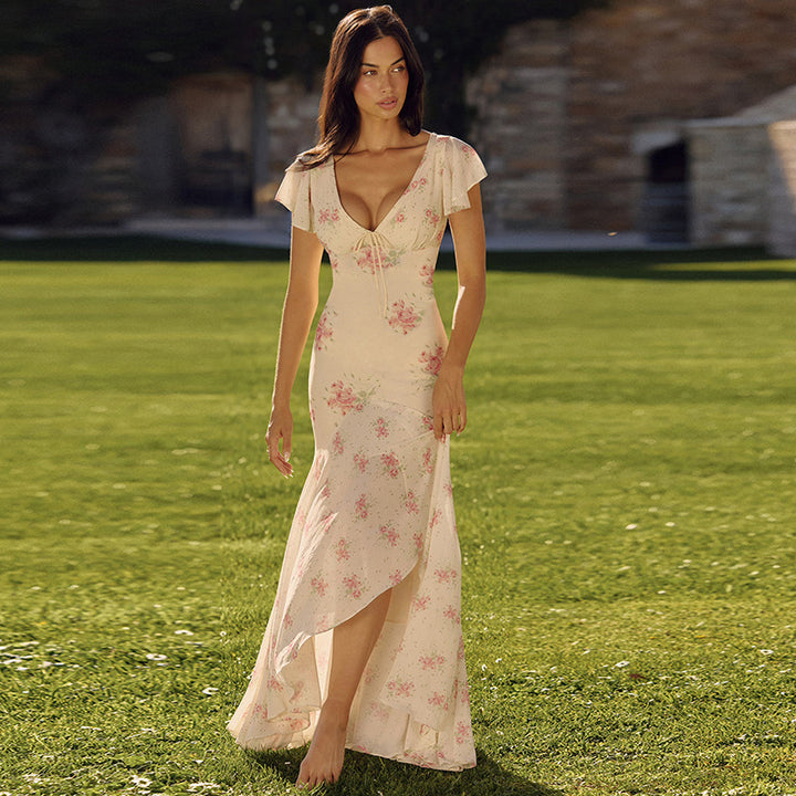 Dame maxiklänning med blommönster och raffinerade cut-outs Mirla-Eva Jonsson