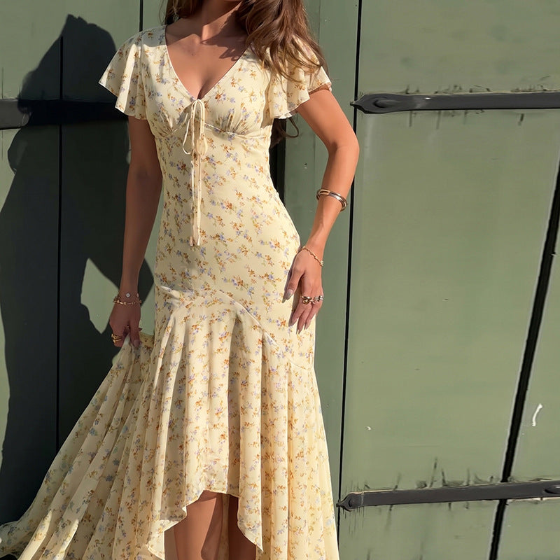 Dame maxiklänning med blommönster och raffinerade cut-outs Mirla-Eva Jonsson