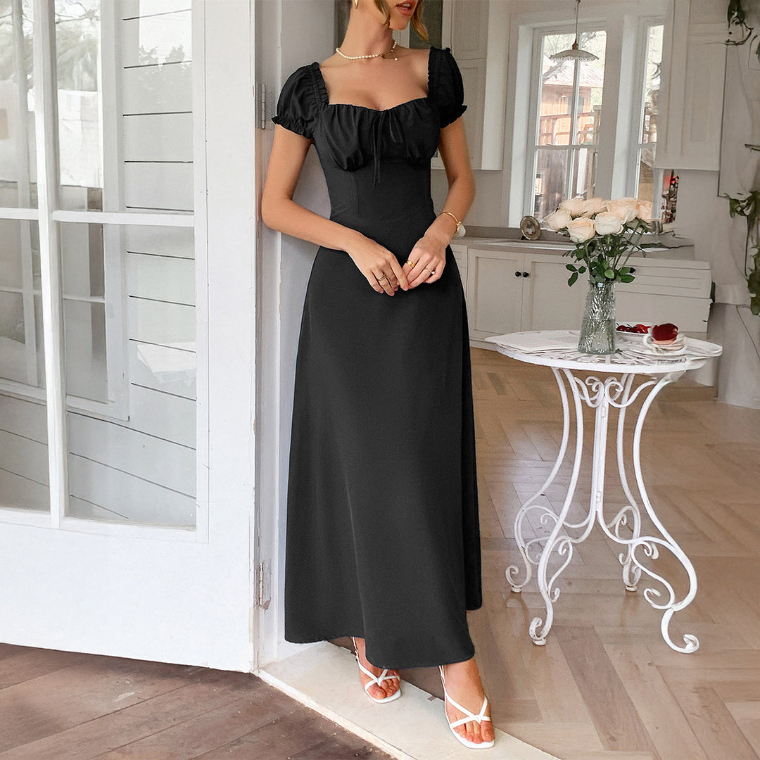 Dame maxiklänning med charmiga volangdetaljer och smickrande snitt Mirla-Eva Jonsson