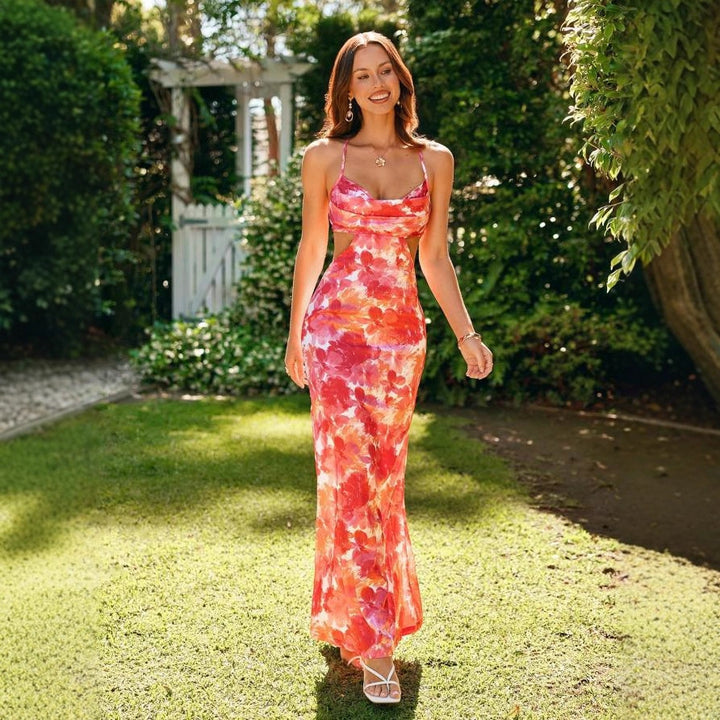Dame maxiklänning med cut-out och blommönster Mirla-Eva Jonsson