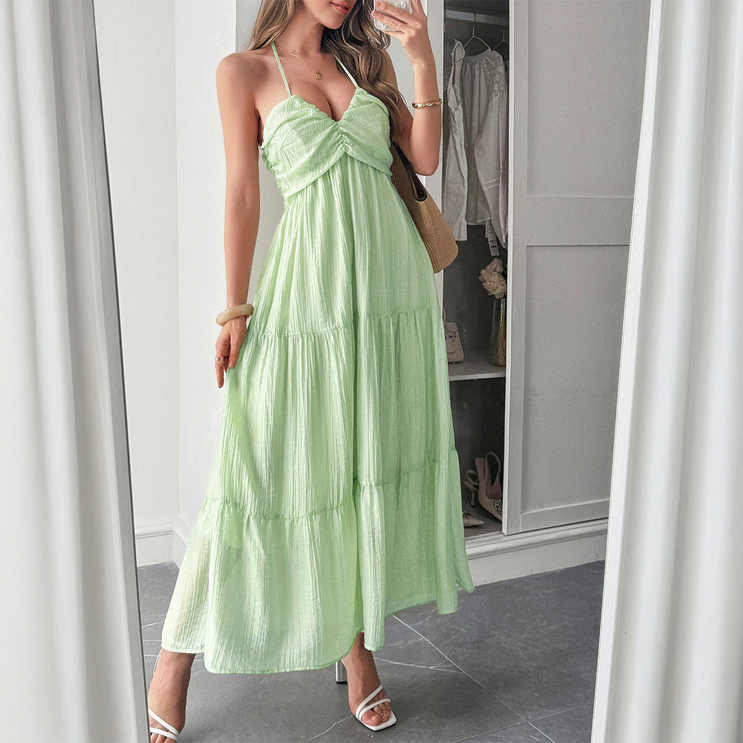 Dame maxiklänning med elegant volangdesign och justerbara spagettiband Mirla-Eva Jonsson