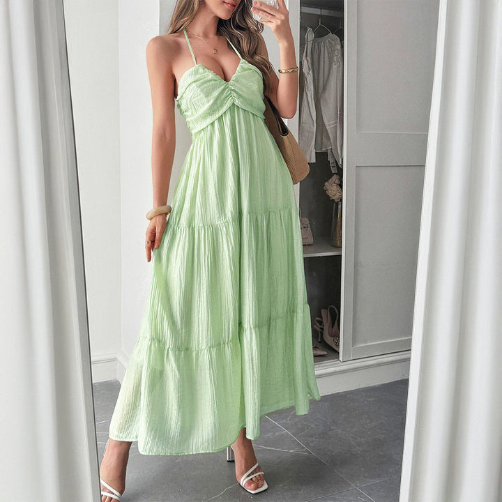 Dame maxiklänning med elegant volangdesign och justerbara spagettiband Mirla-Eva Jonsson