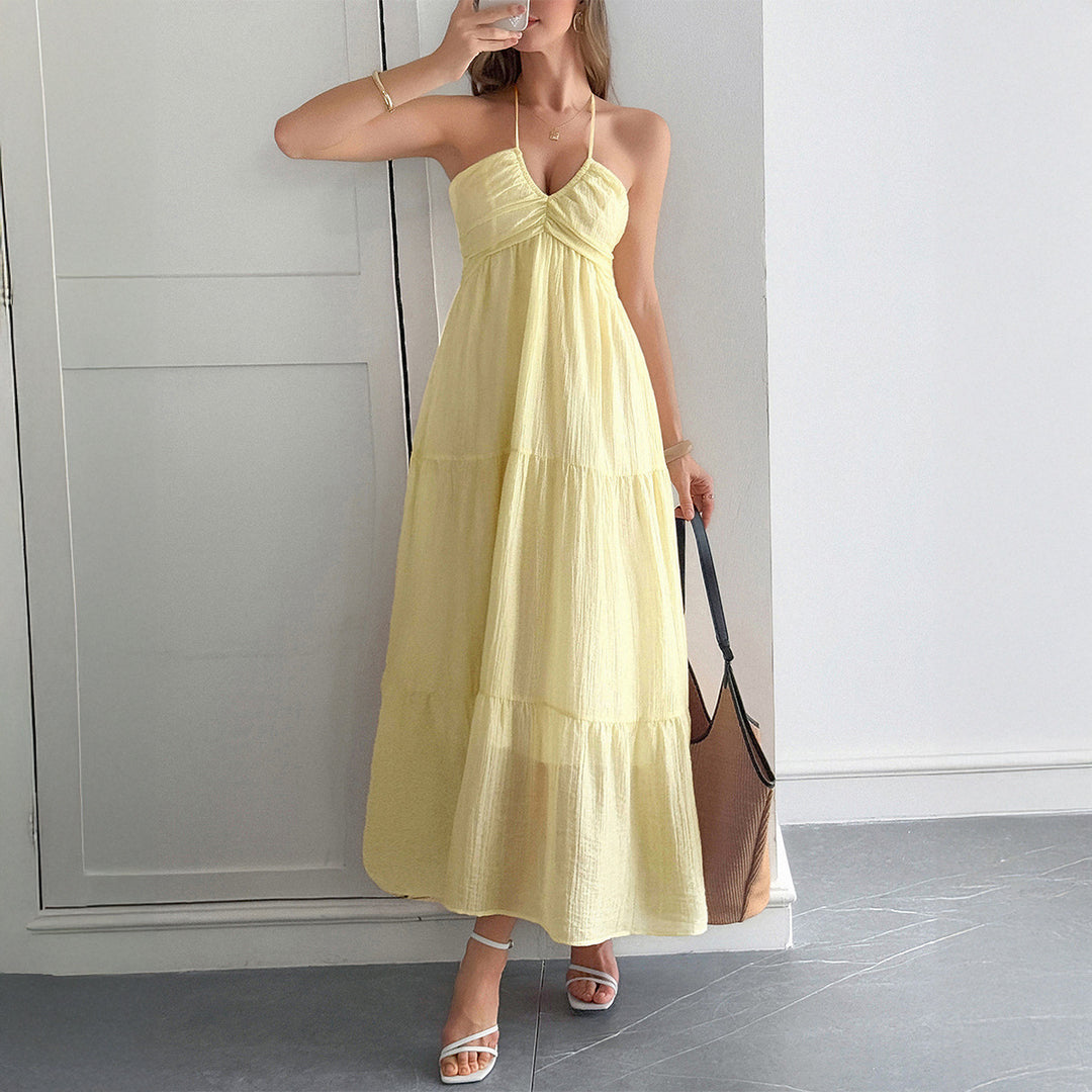 Dame maxiklänning med elegant volangdesign och justerbara spagettiband Mirla-Eva Jonsson