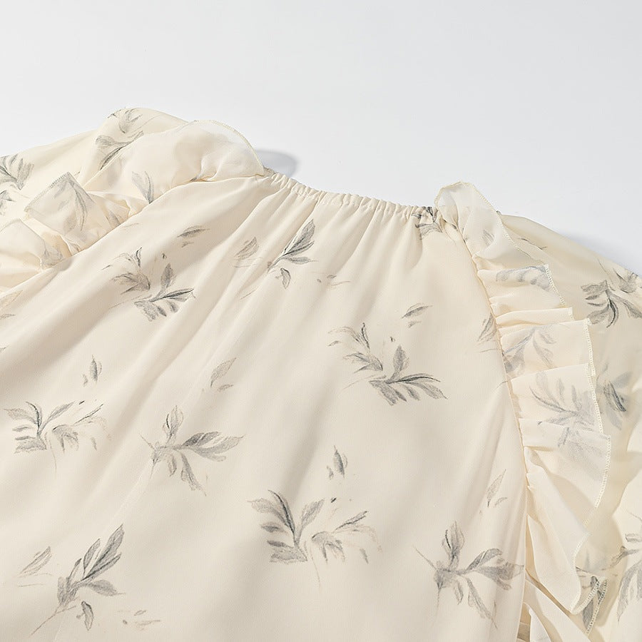 Dame maxiklänning med eleganta volangdetaljer och blommigt mönster Mirla-Eva Jonsson