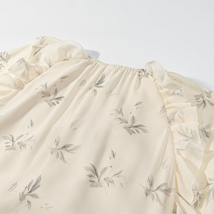 Dame maxiklänning med eleganta volangdetaljer och blommigt mönster Mirla-Eva Jonsson