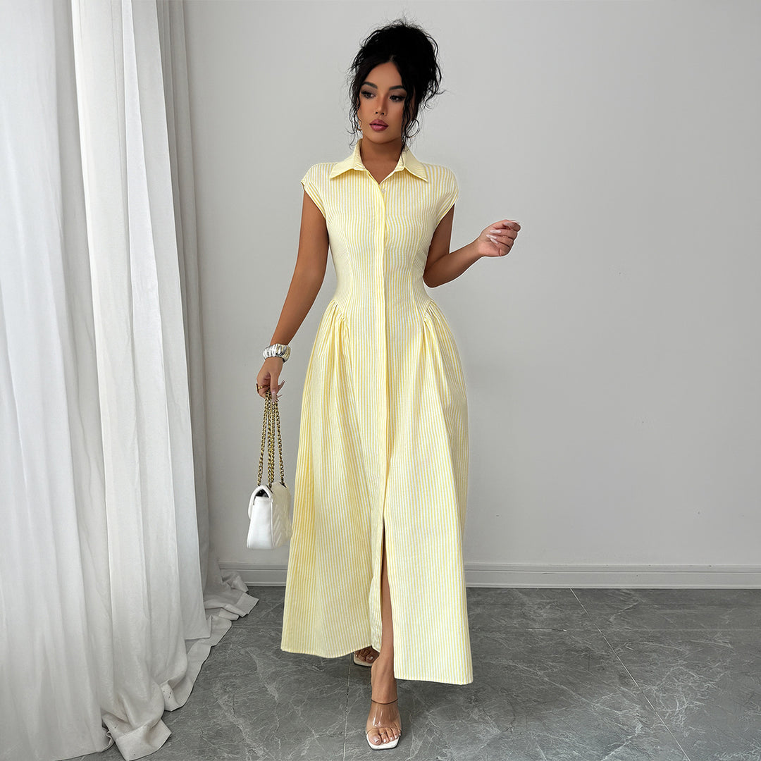 Dame maxiklänning med klassisk skjortblusdesign och eleganta veck Mirla-Eva Jonsson