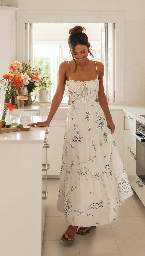Dame maxiklänning med lekfullt cut-out-design och dekorativ snörning Mirla-Eva Jonsson