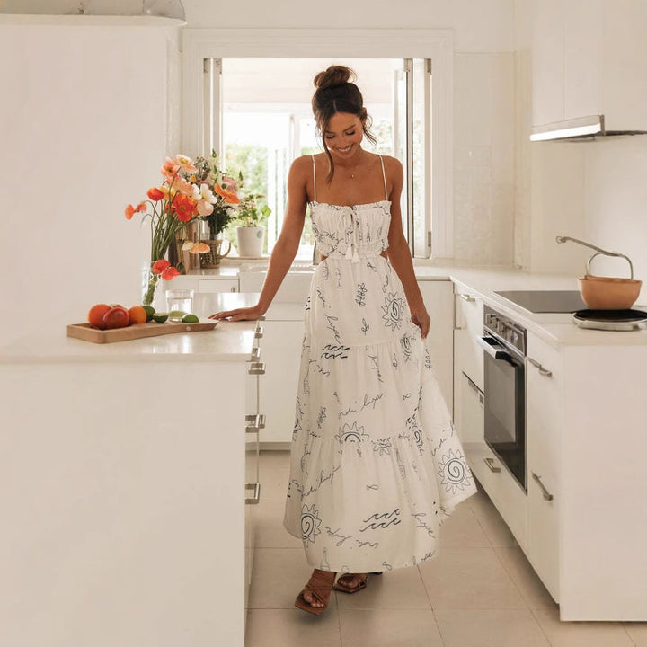 Dame maxiklänning med lekfullt cut-out-design och dekorativ snörning Mirla-Eva Jonsson