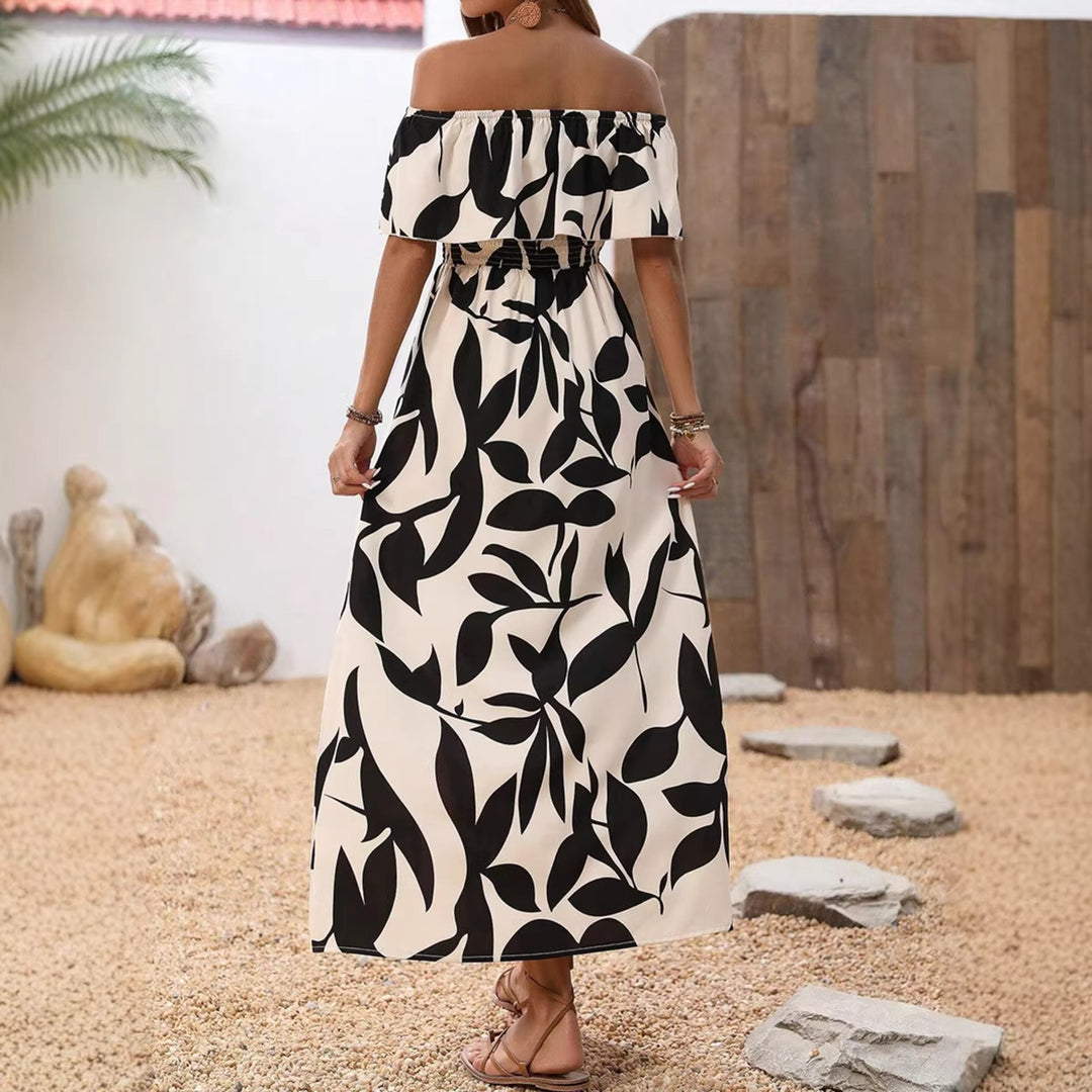Dame maxiklänning med off-shoulder design och blommönster Mirla-Eva Jonsson