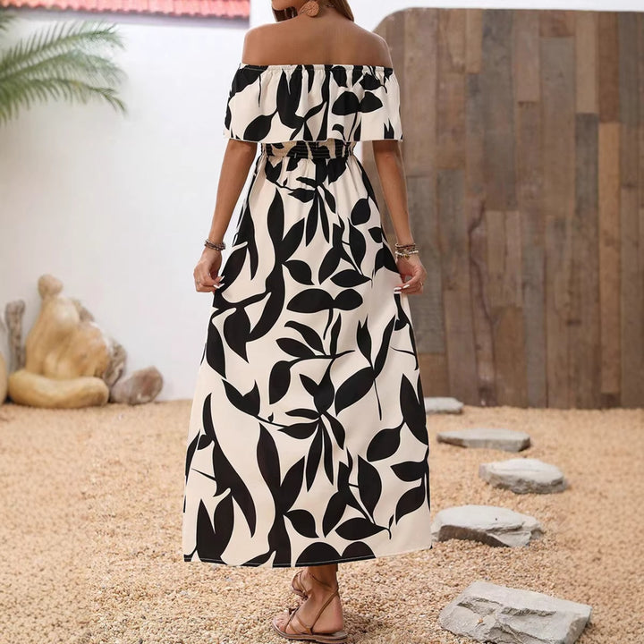 Dame maxiklänning med off-shoulder design och blommönster Mirla-Eva Jonsson