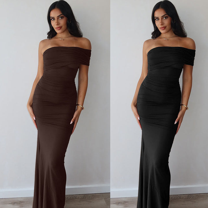 Dame maxiklänning med off-shoulder design och figurnära snitt Mirla-Eva Jonsson