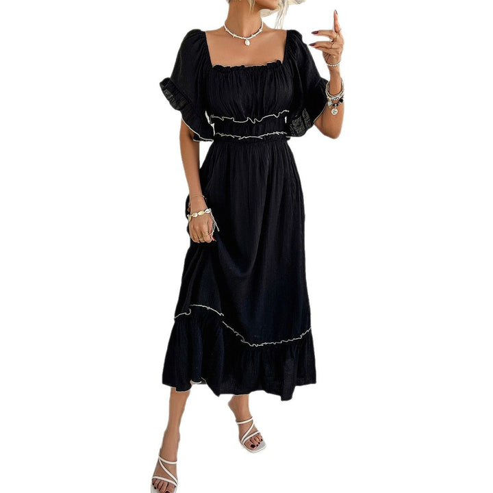 Dame maxiklänning med off-shoulder-utskärning och volangdetaljer Mirla-Eva Jonsson