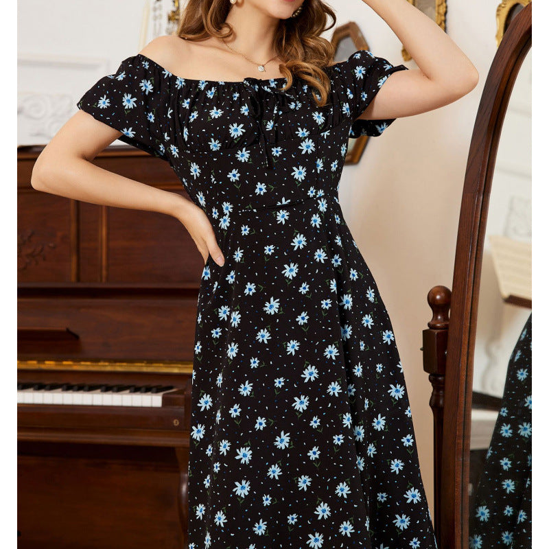 Dame maxiklänning med voluminösa volangärmar och blommönster Mirla-Eva Jonsson