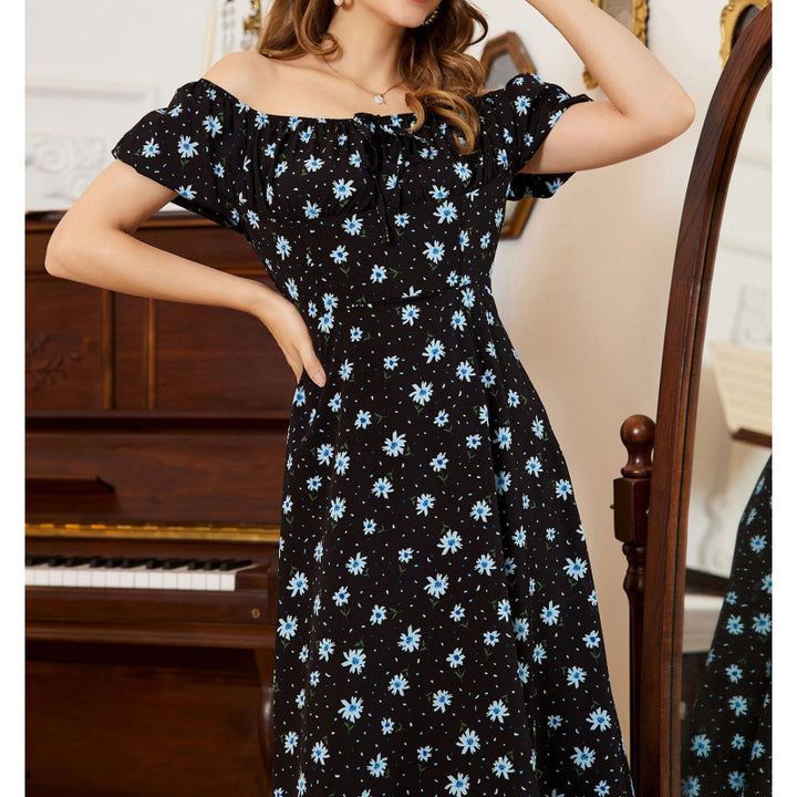 Dame maxiklänning med voluminösa volangärmar och blommönster Mirla-Eva Jonsson