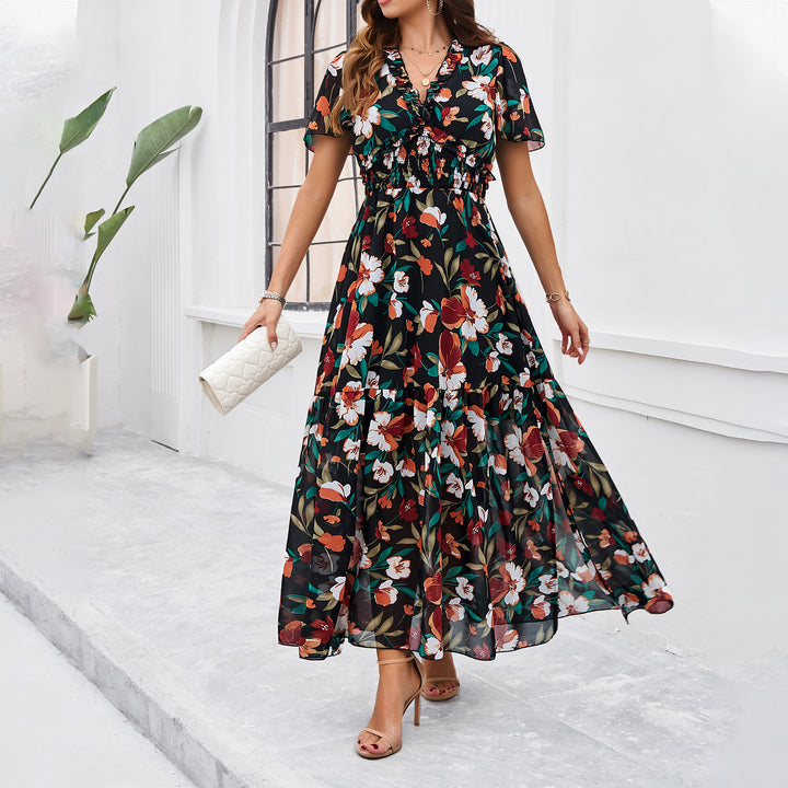 Dame midi-dress med floral gathering og elegant V-hals Mirla-Eva Jonsson