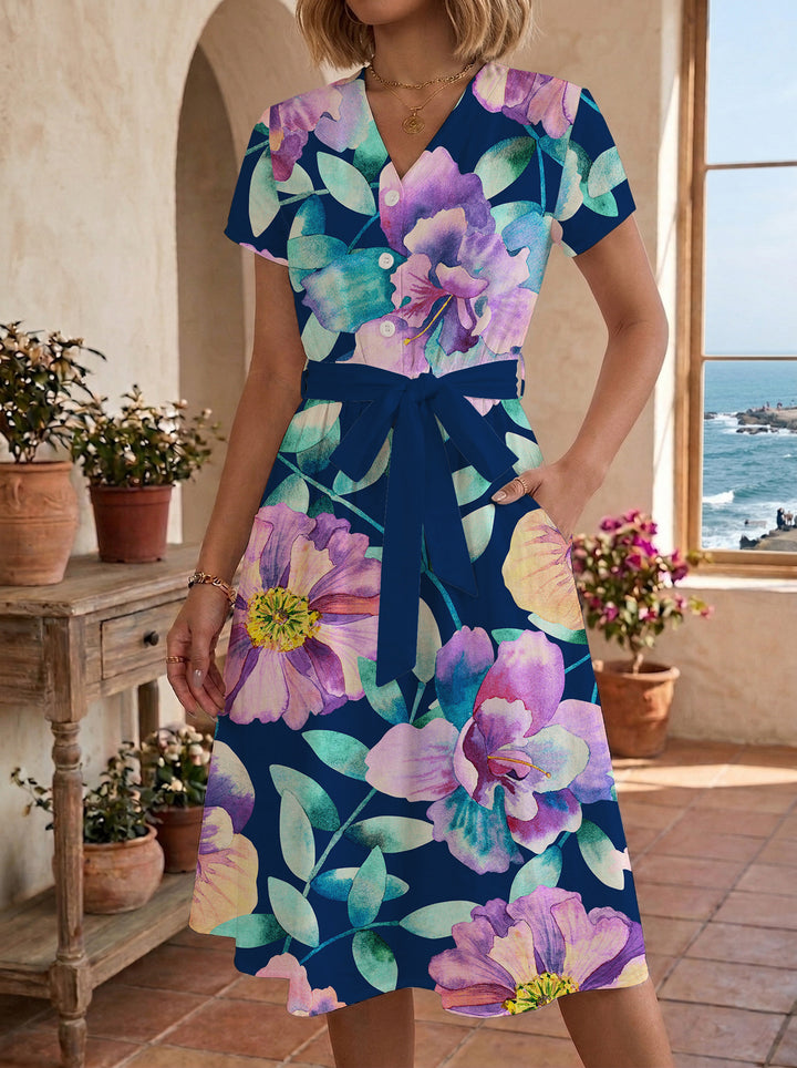 Dame midikleid med blommönster och midjebälte Mirla-Eva Jonsson