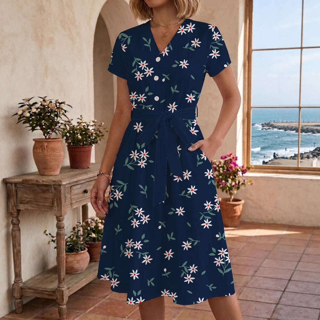 Dame midikleid med blommönster och midjebälte Mirla-Eva Jonsson
