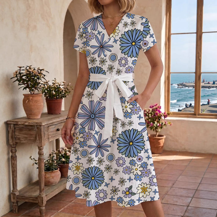 Dame midikleid med blommönster och midjebälte Mirla-Eva Jonsson