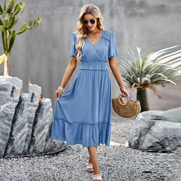 Dame midiskirt med cape, elastiskt midjeband och eleganta volanger Mirla-Eva Jonsson