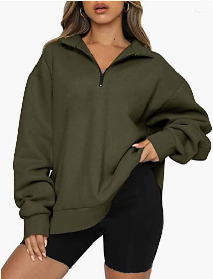 Dame mode oversized tröja med kort dragkedja och avslappnade ärmar Mirla-Eva Jonsson