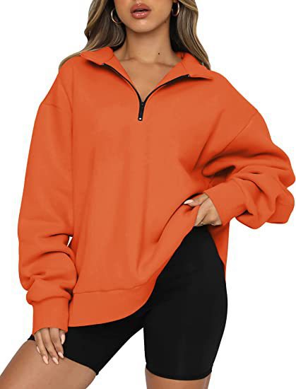 Dame mode oversized tröja med kort dragkedja och avslappnade ärmar Mirla-Eva Jonsson