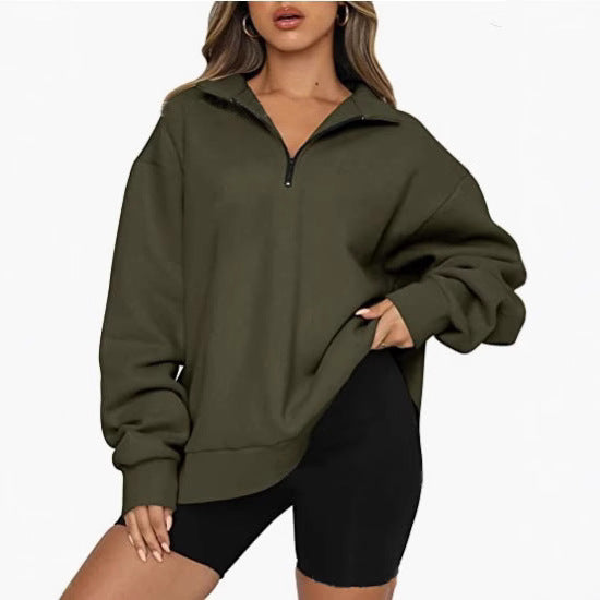 Dame mode oversized tröja med kort dragkedja och avslappnade ärmar Mirla-Eva Jonsson