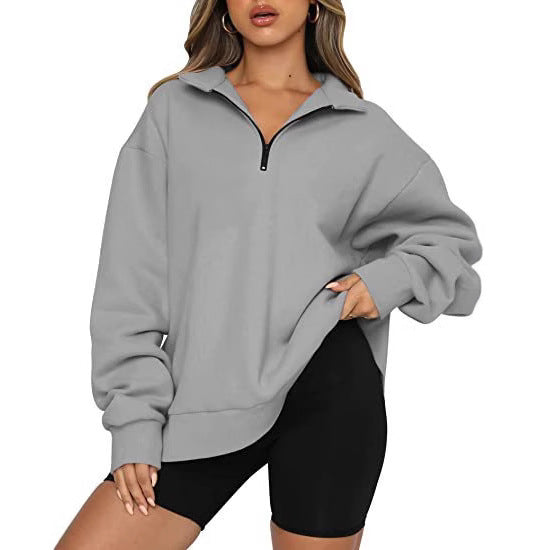 Dame mode oversized tröja med kort dragkedja och avslappnade ärmar Mirla-Eva Jonsson