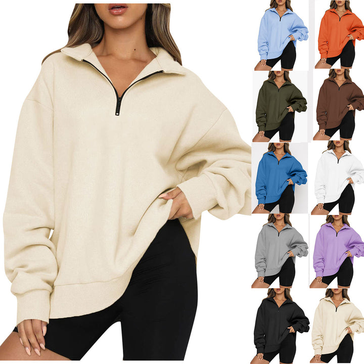 Dame mode oversized tröja med kort dragkedja och avslappnade ärmar Mirla-Eva Jonsson