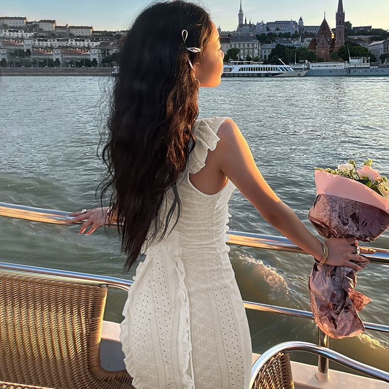 Dame off-shoulder maxiklänning med volangdetaljer och figursydd silhuett Mirla-Eva Jonsson