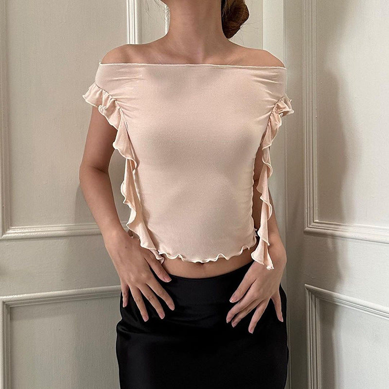 Dame off-shoulder topp med ruffle detaljer och figurnära passform Mirla-Eva Jonsson
