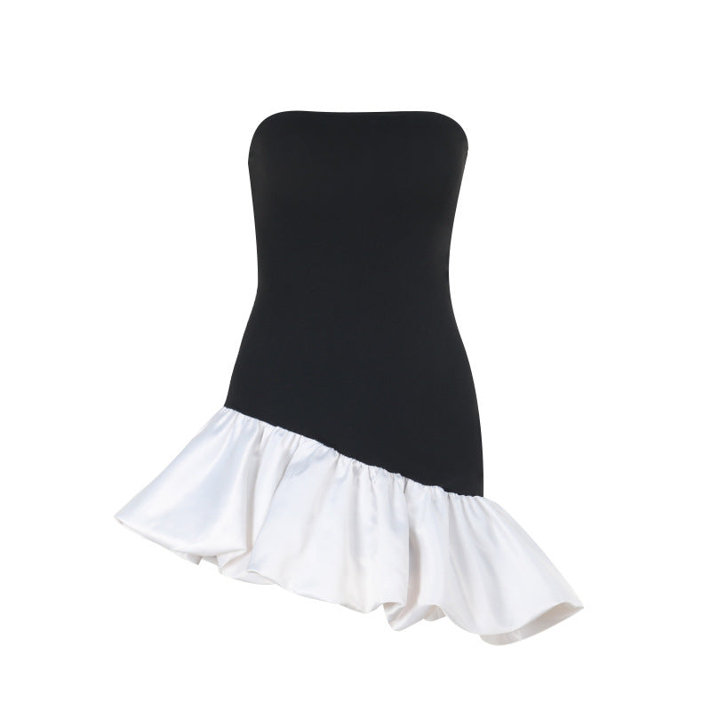 Dame off-shoulder wrap dress with asymmetrical hem and color contrasting ruffle Mirla-Eva Jonsson