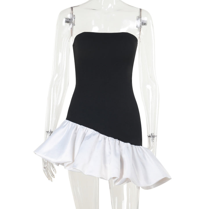 Dame off-shoulder wrap dress with asymmetrical hem and color contrasting ruffle Mirla-Eva Jonsson