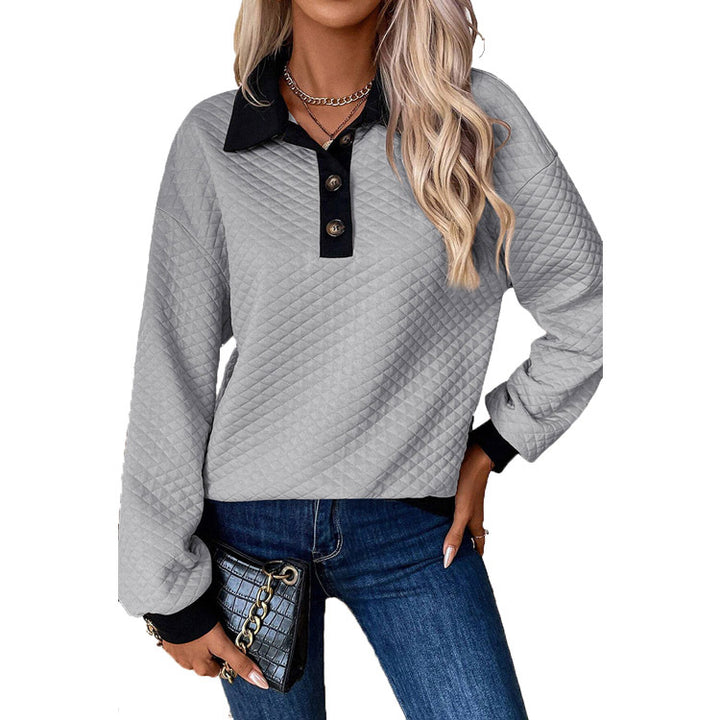 Dame oversized quiltad tröja med klassisk krage och praktiska knappdetaljer Mirla-Eva Jonsson