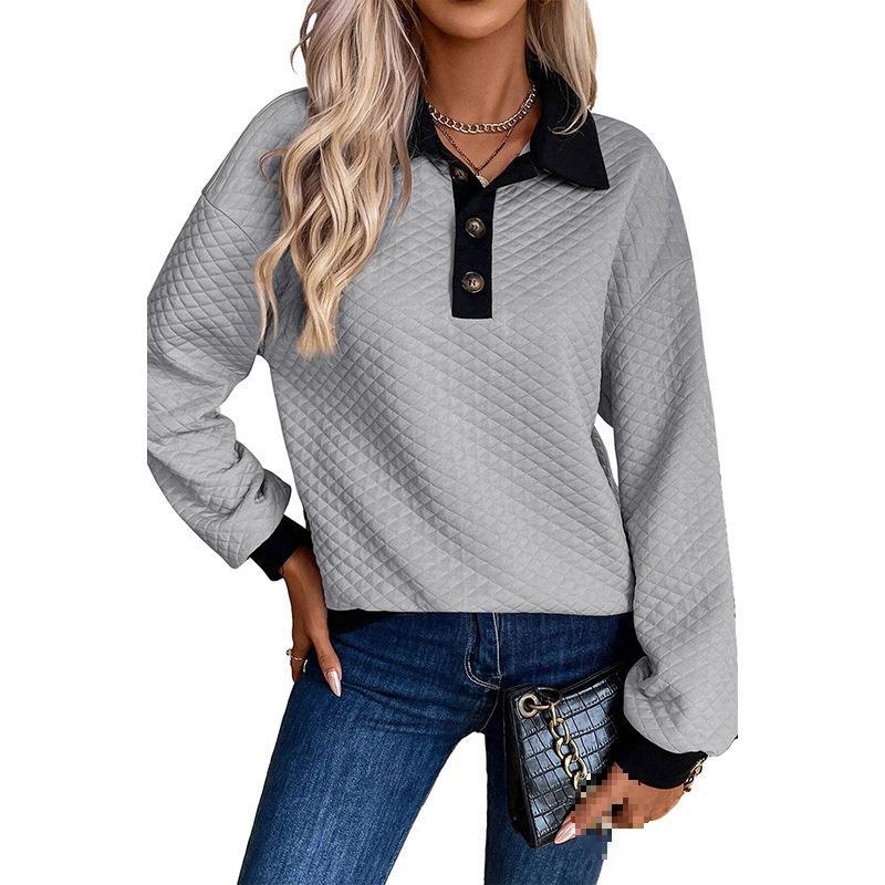 Dame oversized quiltad tröja med klassisk krage och praktiska knappdetaljer Mirla-Eva Jonsson
