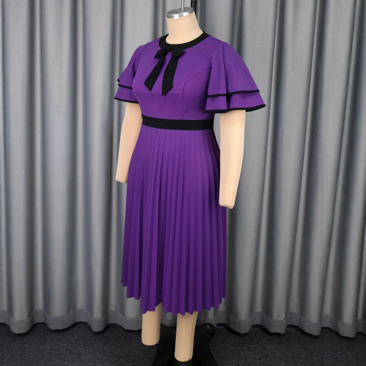 Dame plisserat midikjol med eleganta rufflesdetaljer Mirla-Eva Jonsson